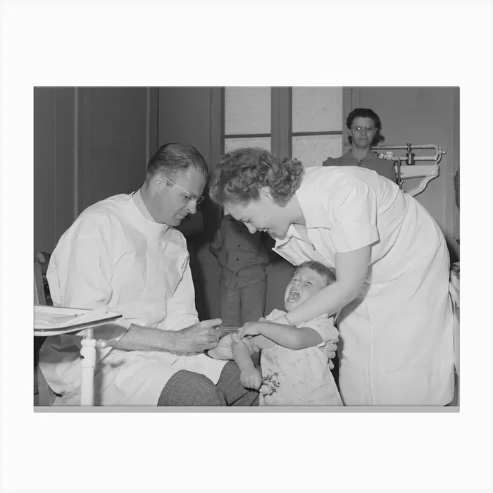 Doctor And Nurse Give Daughter Of Farm Worker Tick Fever Serum At The Fsa (Farm Security Administration) Labor Canvas Print by Fy! Classic Art Prints and Posters