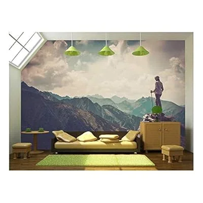 Woman Hiker on a Top of a Mountain – Removable Wall Mural | Self-Adhesive Large Wallpaper – 100×144 inches
